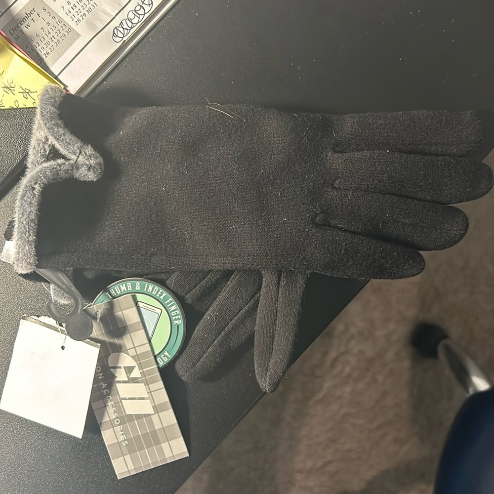 Never worn. Brand new with tags gloves
